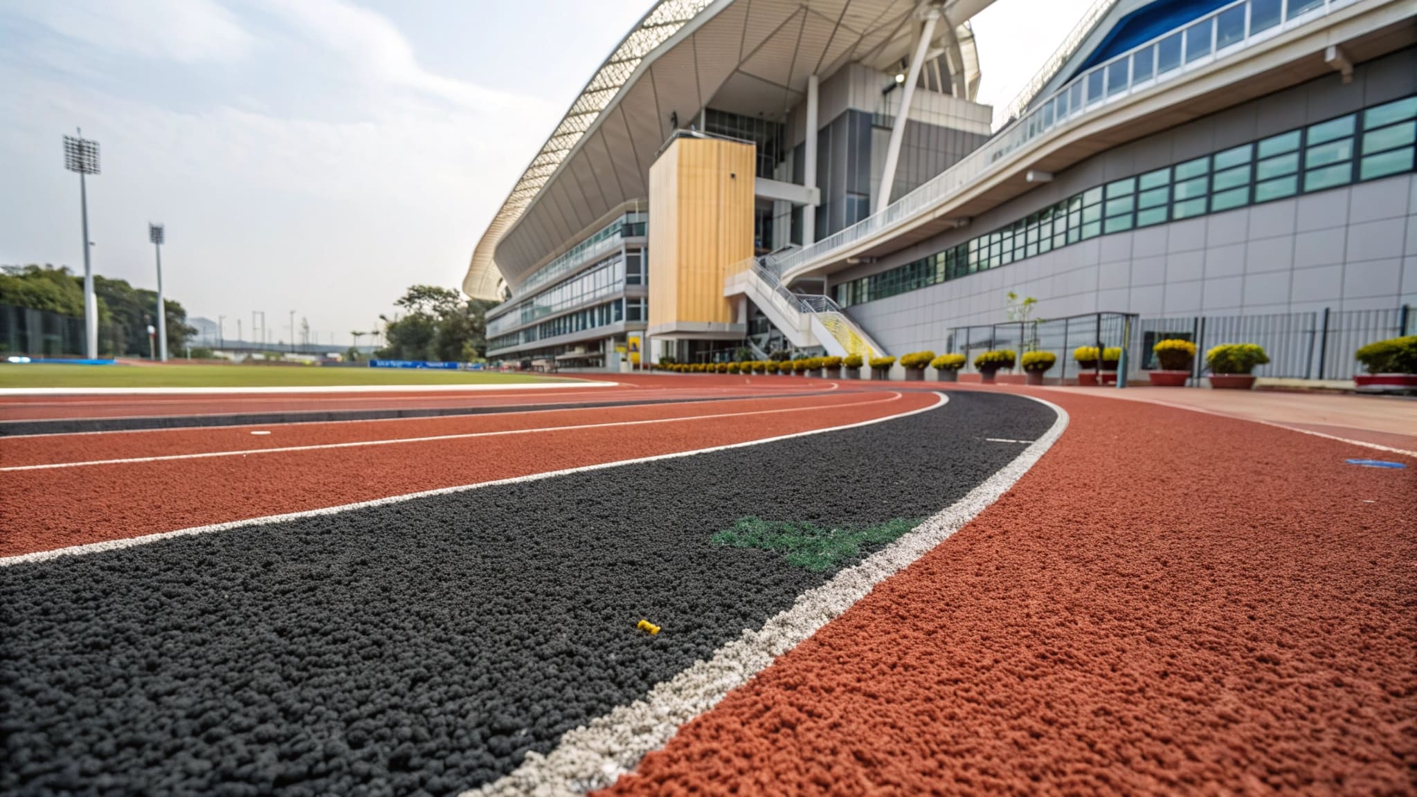 Close-up of running track material samples showing texture and layers